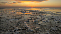 Wattenmeer und Sonnenuntergang